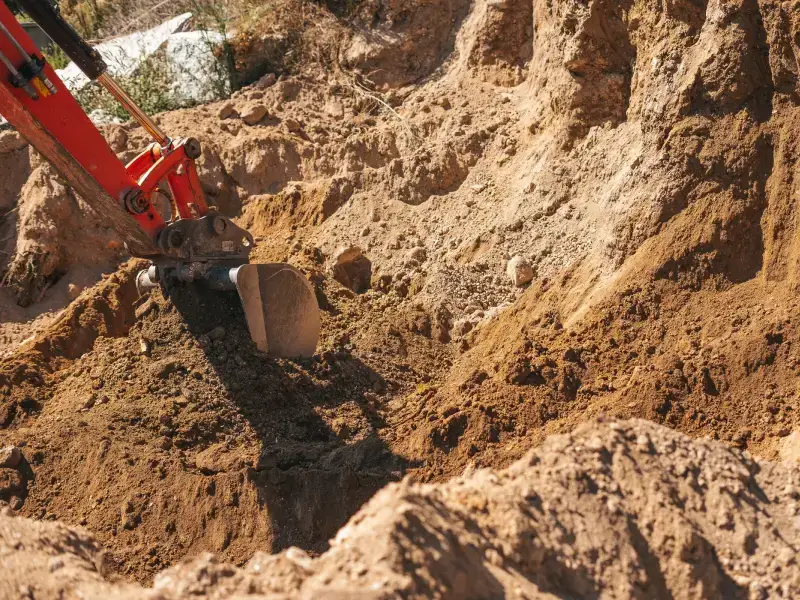 Excavator digging during earthwork