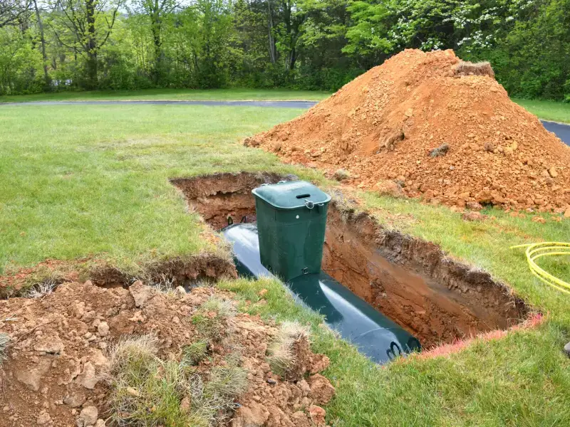 Septic tank being installed in a residential yard